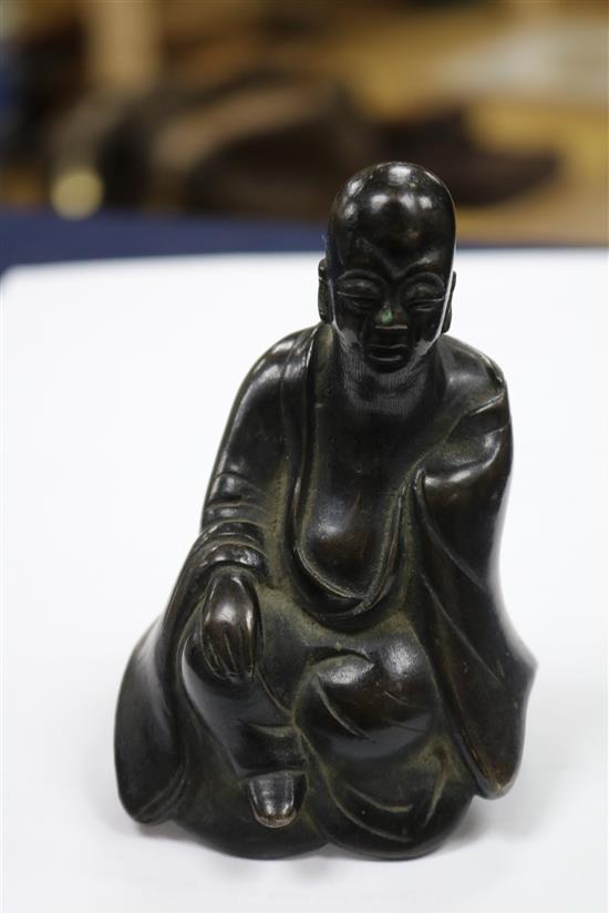 A modern soapstone seal, an 18th century Chinese bronze figure from a censer and a Chinese bronze of a napa cabbage and cricket tallest